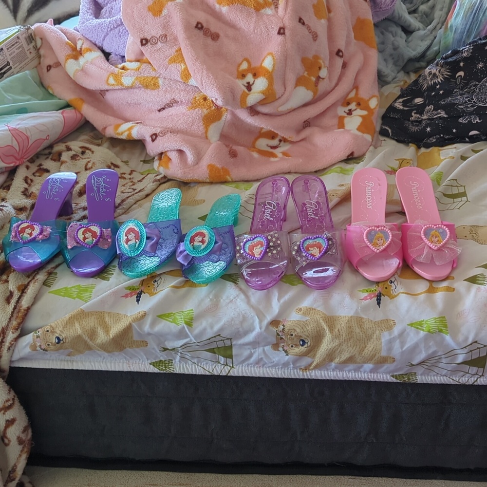 4 pair of Disney princess shoes
